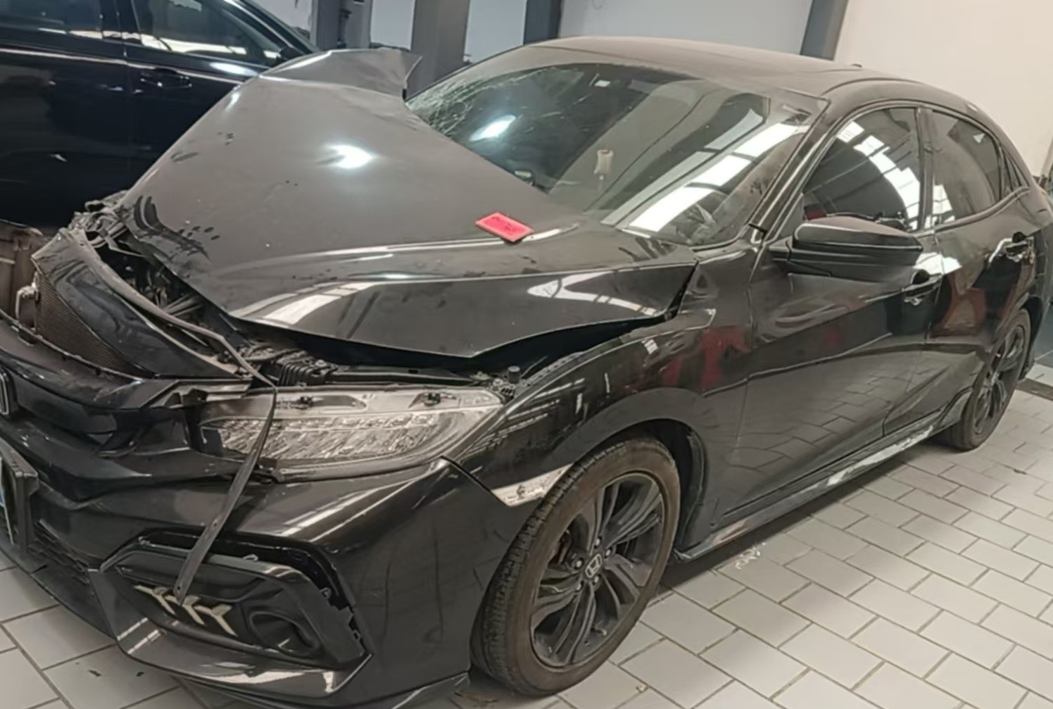 思域牌DHW7154FKCSF受损车辆1台